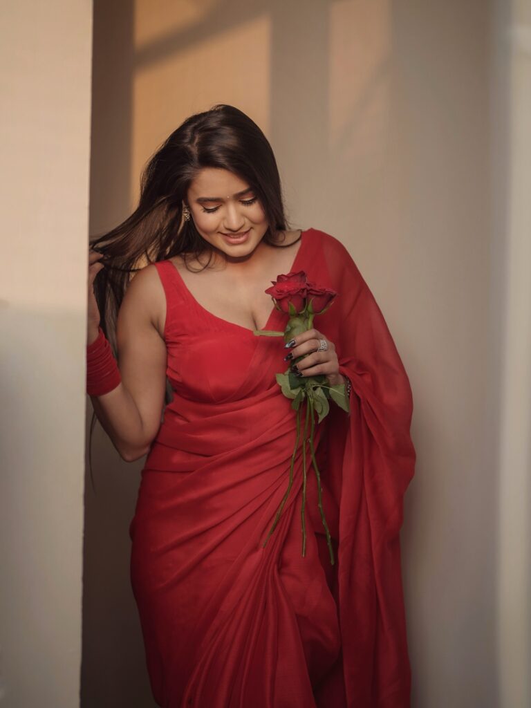 garima chaurasia red saree rose bouquet portrait