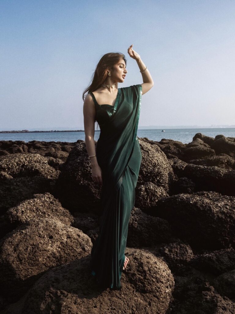 south indian actress sreeleela green saree seaside wallpaper.jpg