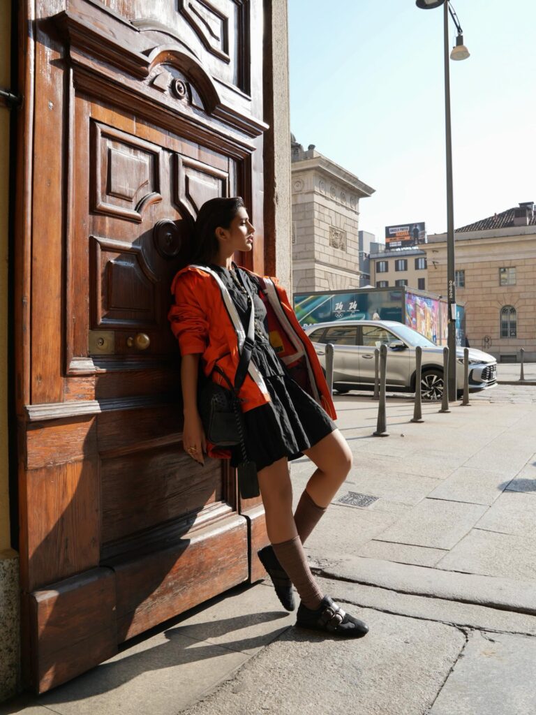 sreeleela milan street style orange jacket hd photos download.jpg