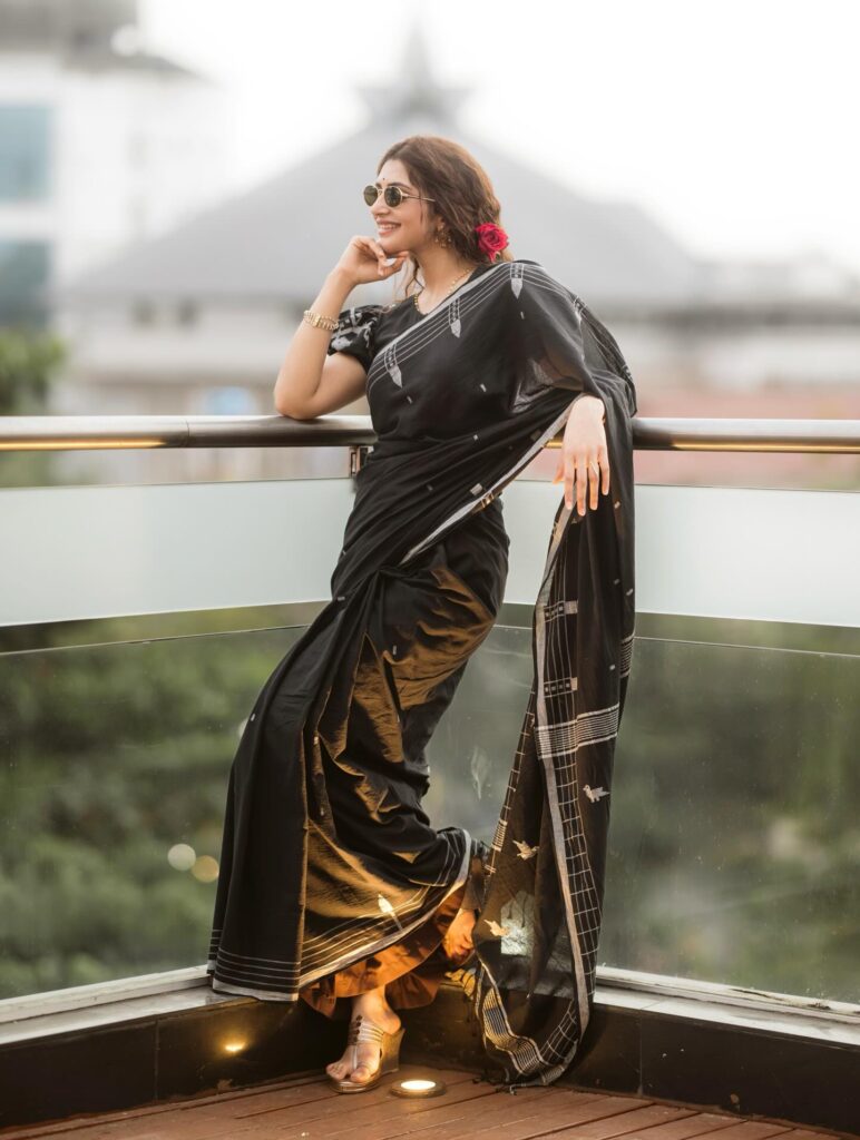 sreeleela vintage fashion black saree balcony photoshoot.jpg